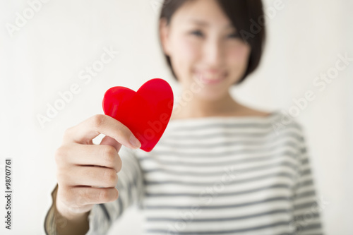 Fotografia Smile of the woman have a red heart