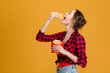 © Drobot Dean - Profile of beautiful happy woman tasting french fries