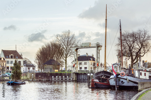 Poster The museum harbor of Gouda in the Netherlands with monumental ships from the beginning of 1900