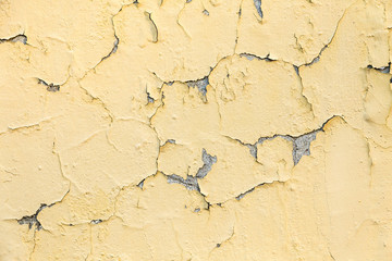 Poster - peeling yellow and white paint on a rough surface