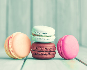 Wall Mural - Colorful macaroons over vintage turquoise wood