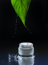 Moisturizing Cream For Dry Skin, Black  Water Background, Green Leaf, Splash
