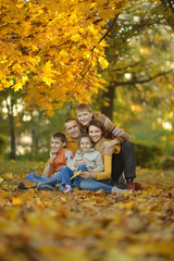 Sticker - Happy family in autumn forest