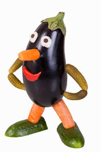 Funny Figure Carved Out Of An Aubergine - Isolated
