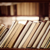 Fototapeta  - Stack of books on library bookshelf - Square composition