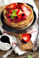 Wall Mural - Stack of pancakes with fresh strawberry and balsamic glase in fr