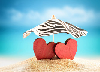 Wall Mural - Two hearts on the summer beach