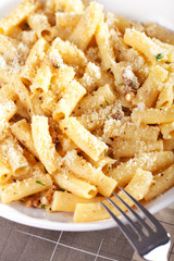 Canvas Print - Penne with tomatos and parmesan cheese