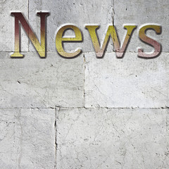 Fototapete - News carved on white stone wall