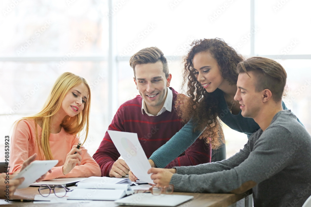 Young business people discussing a new project in a conference room