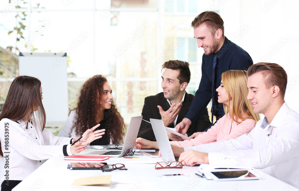 Young business people discussing a new project in a conference room