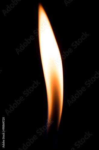 Fotomural a flame of fire from the cigarette lighter on a black background