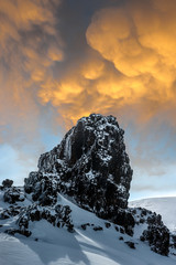 Wall Mural - Rock, snow and sky.