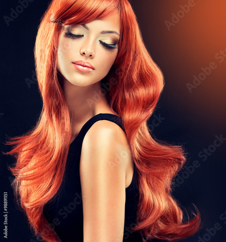 Obraz na plátně Beautiful model girl with long red curly hair