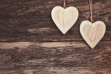 Two Wooden Hearts On Wooden Background. Copy Space, Soft Focus, Toned, Vintage Style