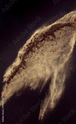 Picture presenting a handful of a dust