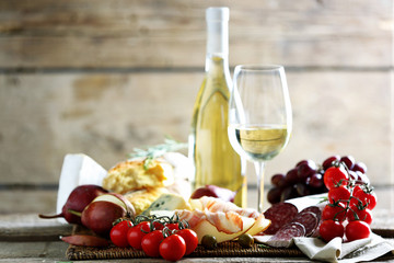 Fototapete - Still life with various types of Italian food and wine