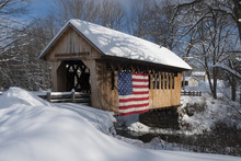 New England Snow Covered Bridge With American Flag