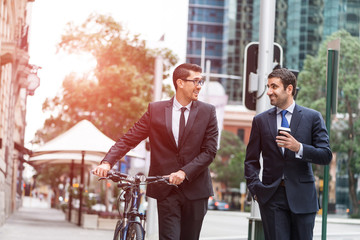 Wall Mural - Two businessmen having walk