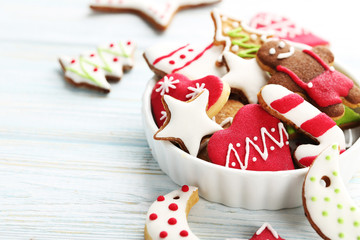 Wall Mural - Christmas cookies in bowl on a blue wooden table