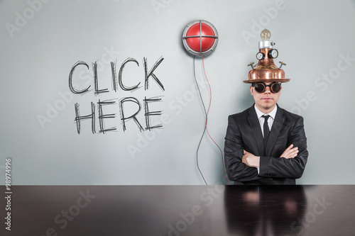 Fotografía Click here text with alert light and vintage businessman
