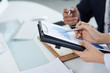 © DragonImages - Analyzing business chart