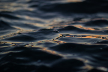 Blurred dark blue sea water