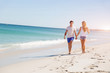 © Sergey Nivens - Romantic young couple on the beach
