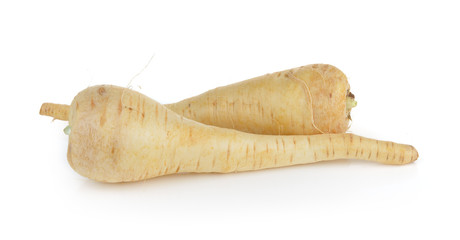  fresh parsnip roots on a white background