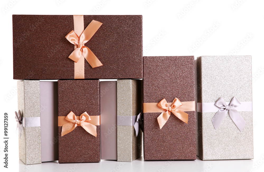 Beautiful brown and silver Christmas gifts isolated on white background