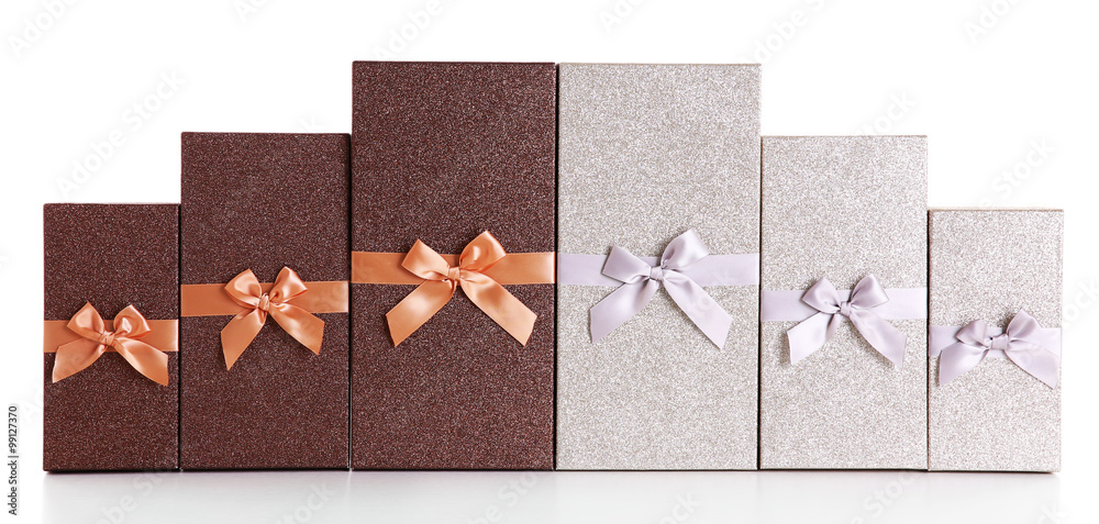 Beautiful brown and silver Christmas gifts isolated on white background