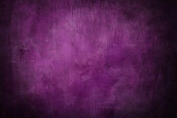 grunge purple background or texture with dark vignette borders