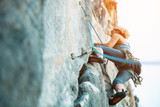 Fototapeta Konie - Rock climbing on vertical flat wall - Stock image