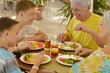 © aletia2011 - Grandparents with grandchildren at breakfast