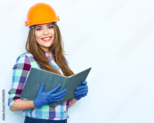 Fototapeta na wymiar Woman architect hold business paper. Smiling girl portrait