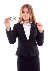 Wall Mural - Pensive businesswoman with glasses,on white background