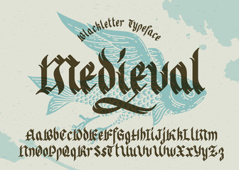 Poster - Gothic medieval typeface. Black-letter fracture font with flying fish illustration.