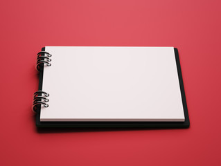 Wall Mural - Blank White Paper Notepad isolated on red background