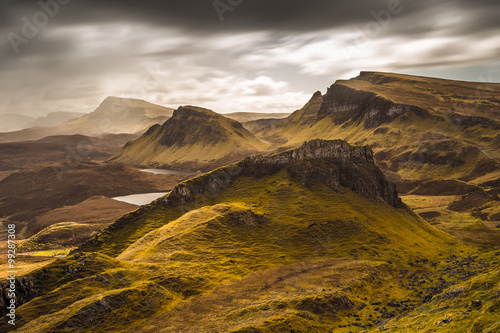 Cuadros en Lienzo Dark clouds and beautiful colors over the Quiraing on the Isle of Skye in Scotla