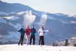 © lkoimages - Young happy friends having fun in winter mountains