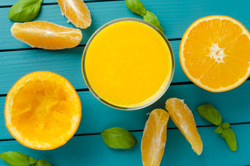 Sticker - Fresh orange juice on wooden table