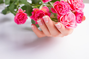 Fotomurales - French manicure with pink roses.