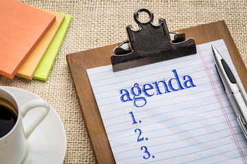 Wall Mural - agenda list on clipboard and coffee