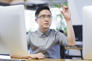 IT worker developing smart phone