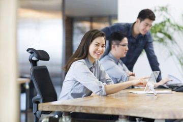IT workers developing digital tablet