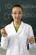 © Blue Jean Images - Scientist Holding Test Tube