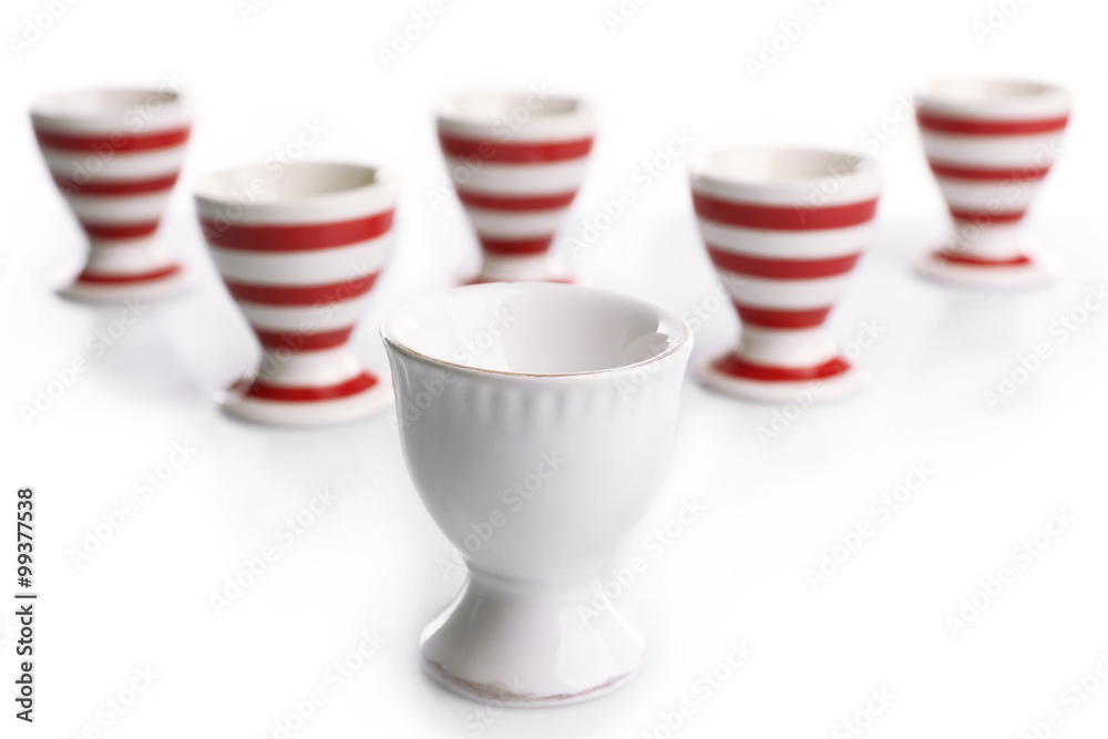 Red and White stripe egg cups, isolated on white