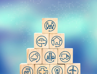 Poster - Internet of things feature icon on wood cube pyramid with blur b