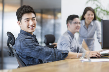 IT workers developing digital tablet
