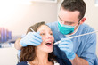 © Production Perig - Young attractive woman being cured by a dentist
